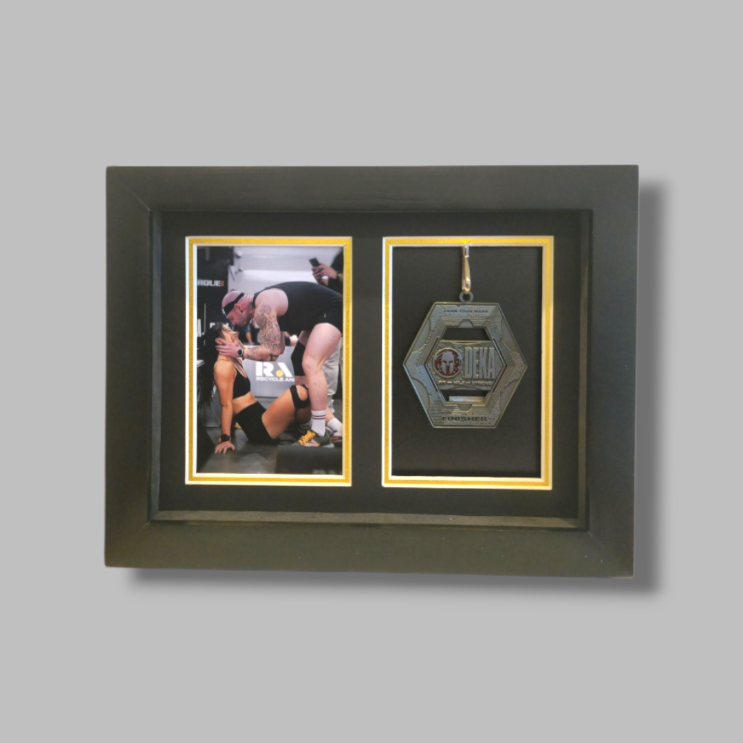 Framed sports memorabilia with photo and a medal